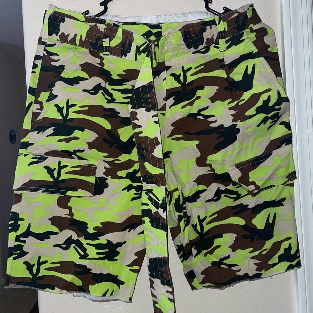 Neon green camouflage shorts.
